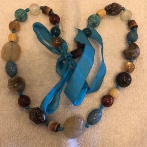 Necklace and bracelet with turquoise ribbon